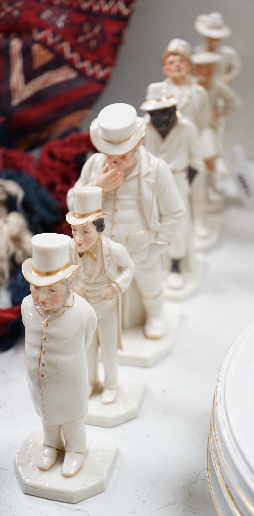Seven Royal Worcester Hadleys figures of the World, tallest 17.5 cm
